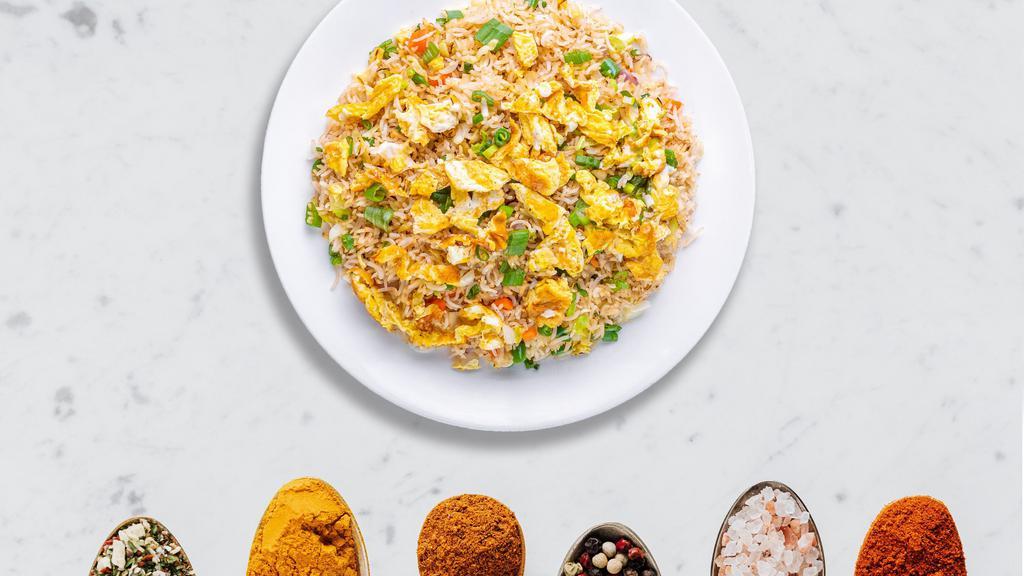 Egged on Fried Rice · Egg with basmati rice stir fried and cooked in Indian and Chinese sauces