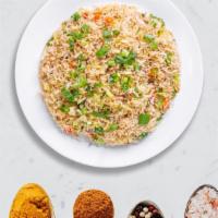 Golden Wall Veggie Fried Rice · Seasonal vegetables with basmati rice stir fried and cooked in Indian and Chinese sauces. Ve...