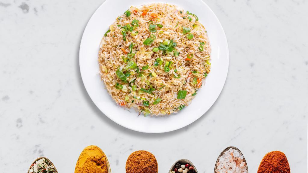Golden Wall Veggie Fried Rice · Seasonal vegetables with basmati rice stir fried and cooked in Indian and Chinese sauces. Vegan.