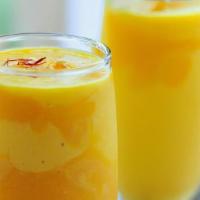 Mango Lassi · Fresh Indian milkshake made with yogurt, milk and mango pulp