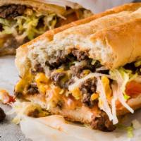 The Chopped Cheese · seasoned ground beef with sautéed onions on a hoagie roll, topped with melted american chees...