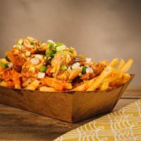 Buffalo Chicken Fries · grilled chicken topped with green onions, shredded cheese and buffalo sauce.