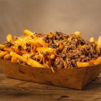 Philly Cheesesteak Fries · thinly sliced rib eye with grilled onions and melted provolone cheese.