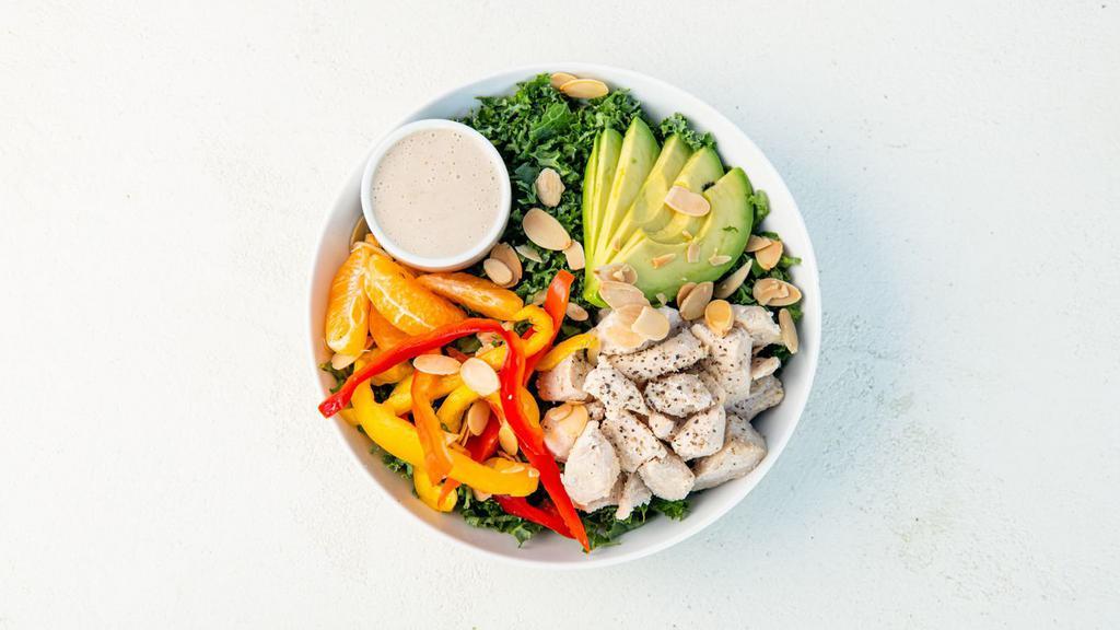 Sesame Chicken Salad · Chopped kale, roasted chicken, avocado, mandarin oranges, sliced peppers, roasted almonds, green onions, sesame seeds, and creamy sesame dressing (served on the side). (gluten-free)