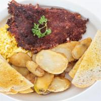 3. Corned Beef Hash · With two eggs, potatoes, buttered toast, and jelly.