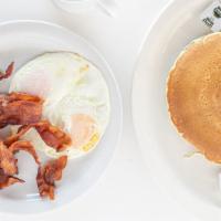 B. Pancake & Sausage · Two pancakes, three pieces of bacon or sausage, butter, and syrup.