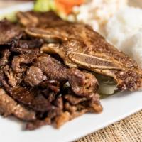 #7. BBQ Beef & Short Ribs · BBQ Beef and Beef Short Ribs over cabbage and broccoli, includes 2 scoops of rice and 1 scoo...