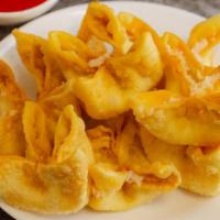 Crab Rangoon (8 Pcs) · Fried wonton with cream cheese and crab imitation inside