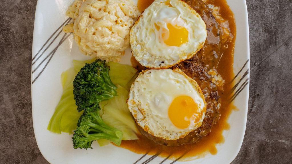 Loco Moco · 2 burger patties with 2 eggs topped with gravy over white rice, includes macaroni salad, cabbage and broccoli on side.