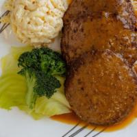 Hamburger Steak · 3 beef burger patties topped with gravy over white rice, includes macaroni salad, cabbage an...