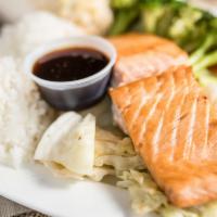 Teriyaki Grilled Salmon · Grilled Salmon with homemade Teriyaki sauce over cabbage and broccoli, includes 2 scoops of ...