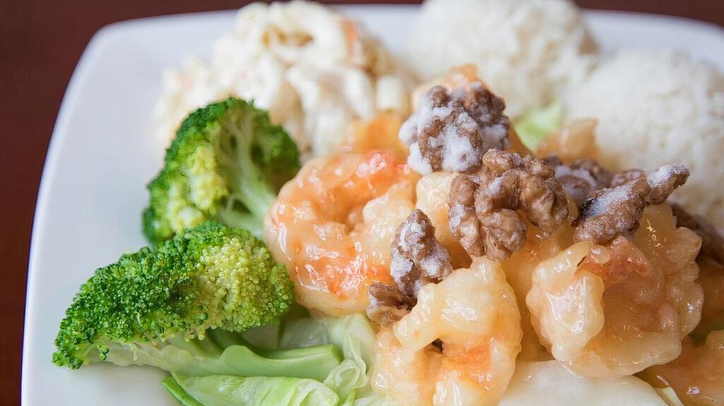 Honey Walnut Prawns · Chef's special Prawns with homemade sauce and caramelized walnuts over cabbage and broccoli, includes 2 scoops of rice and 1 scoop of macaroni salad.