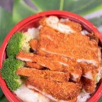 Chicken Katsu Rice Bowl · Chicken Katsu over cabbage, broccoli and white rice.