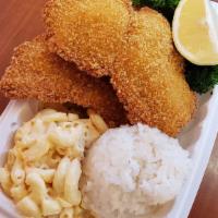 Mini Island White Fish · Deep Fried Fillet Fish with lemon and tartar sauce over cabbage and broccoli, includes 1 sco...