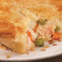 Chicken Pot Pie · Rich chicken and vegetables in gravy baked inside a butter pie crust. Served cold in a micro...