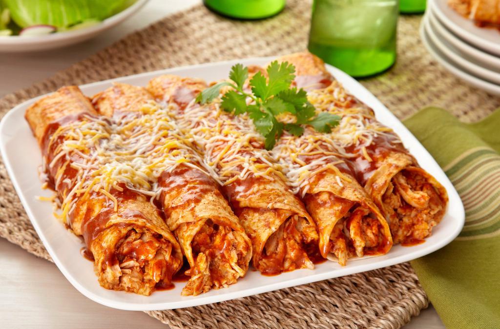 Chicken Enchiladas · Traditional enchiladas with shredded chicken, cheese and enchilada sauce. Served cold in a microwavable container. Reheating required.