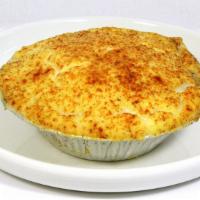 Shepards Pie · Beef with vegetables topped with mashed potatoes sprinkled with paprika. Served cold in a mi...