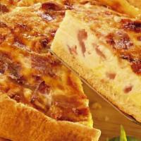 Half Quiche Lorraine · Half Size. Fluffy whole eggs whipped with heavy cream and bacon baked into a pie crust. Serv...