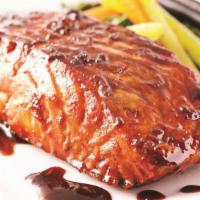 Teriyaki Salmon · Baked salmon with Teriyaki sauce. 6 oz.  Served cold in a microwavable container. Reheating ...