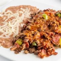 Alambre · your choice of meat with bacon, onions and bell peppers.