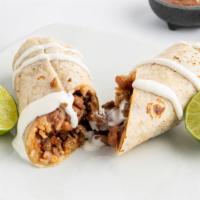 Super Burrito · Your choice of meat, flour tortilla, rice, beans, pico de gallo, sour cream, Jack cheese & a...