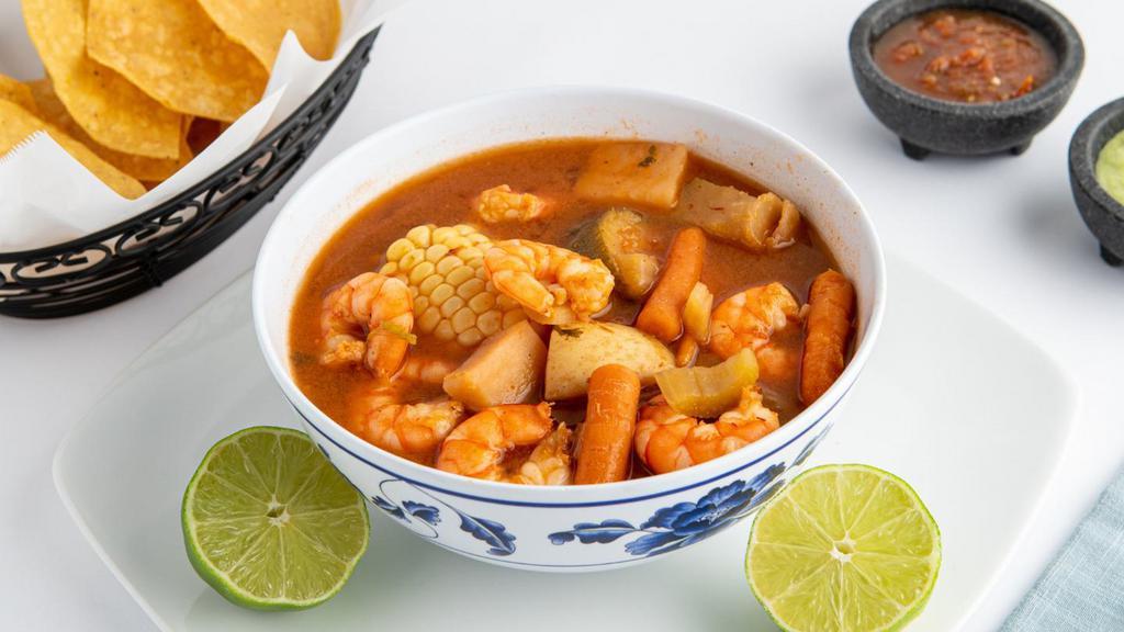 Caldo de Camarones · Shrimp soup with carrots, potatoes, chayote squash & tortillas.
