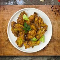 Curry Craving Wings · Breaded and deep-fried chicken wings fried until golden brown before being tossed in curry s...