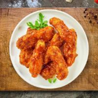 Cookout Boneless Wings · Breaded boneless chicken breast fried until golden brown before being tossed BBQ sauce.
