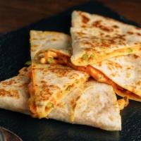 Breakfast  Quesadilla · Famous It’s a Grind Quesadillas filled with your choice of meat, eggs, shredded cheese and c...