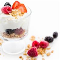 Yogurt Parfait · Yogurt Parfait with Granola and assortment of fruits and berries