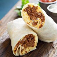 Spicy Chorizo Breakfast Burrito · Two scrambled eggs with spicy chorizo, crispy home fries, melted cheese, jalapenos, and saut...