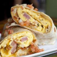 Hungry Ham Breakfast Burrito · Two scrambled eggs with savory ham, crispy home  fries, and melted cheese wrapped up in a 12...