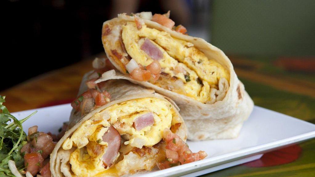 Hungry Ham Breakfast Burrito · Two scrambled eggs with savory ham, crispy home  fries, and melted cheese wrapped up in a 12