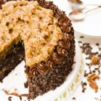 German Chocolate Cake · Sweet layered chocolate cake topped with coconut pecan frosting.