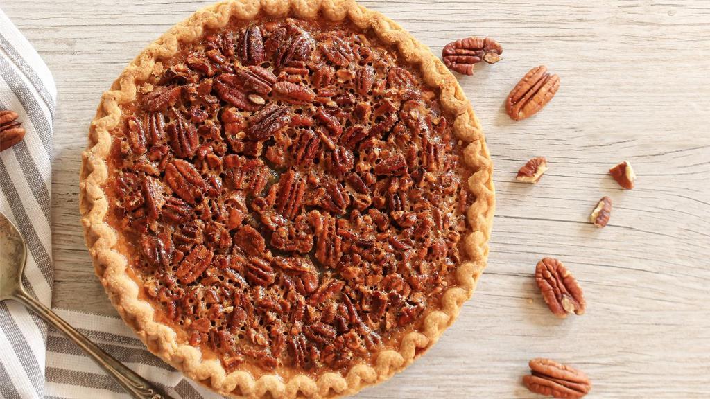 Pecan Pie · Flaky pastry filled with caramel then topped with fresh, buttery pecans.