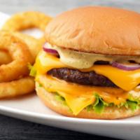 The Onion Ring Cheeseburger · Sizzling beef patty topped with crispy onion rings, lettuce, tomatoes, onions, pickles on fr...