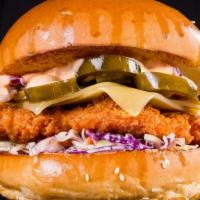 The Jalapeño Crispy Chicken Burger · Fresh fried chicken breast topped on with chopped jalapeños, melted cheese, lettuce, tomatoe...