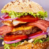 The Crispy Chicken & Bacon Burger · Fresh fried chicken breast topped on with crispy bacon strips, melted cheese, lettuce, tomat...