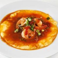 Shrimp & Grits with Spicy Tomato-Bacon Gravy · Sauteed shrimp and cheddar grits in a tomato-bacon sauce(Gluten-free)