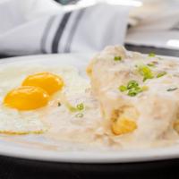 Biscuit & Country Sausage Gravy · One famous cream biscuit  with country sausage gravy and two eggs any style.