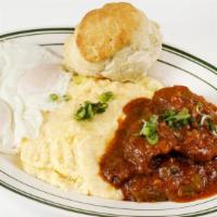 Grillades & Grits · Beef cutlets braised in creole gravy. Served with grits and two eggs any style, plus choice ...