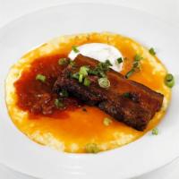 Crispy Pork Belly · Poached egg, cheddar grits and spicy onion relish. Gluten-free.