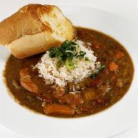 Bowl Chicken & Andouille Gumbo · Brenda's chicken, andouille & okra gumbo with rice, scallions and french bread