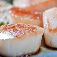 Hibachi Scallops · Tender sea scallops grilled hibachi style with lemon.