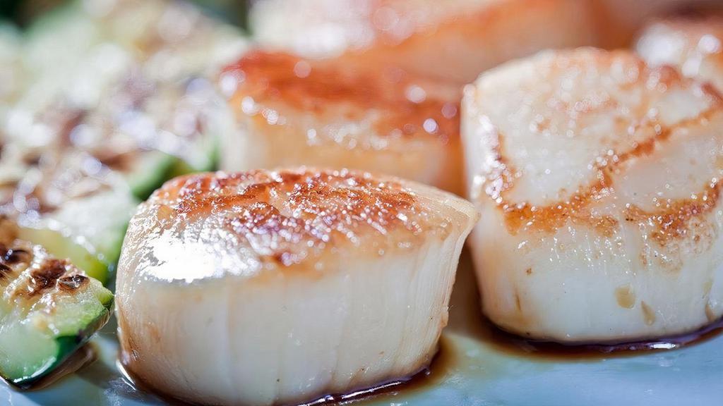 Hibachi Scallops · Tender sea scallops grilled hibachi style with butter and lemon.