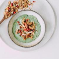 Spirulina Bowl · Green spirulina, Cacao nibs, Chia seeds, Dates, Avocado, Cashew-coconut drink. Topped with G...
