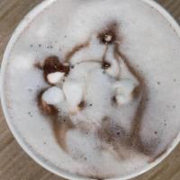 Hot Cocoa · Melted cocoa powder and cream topped with marshmallows and chocolate sauce