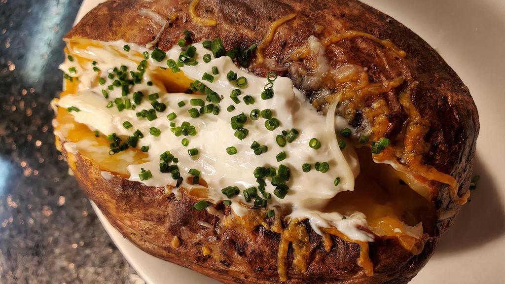 Loaded Baked Potato · Bacon, Sour Cream, and Chives