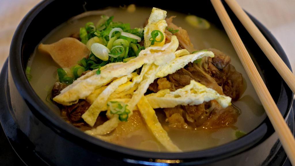 Seolleongtang · Ox bone soup with beef brisket and white noodles.