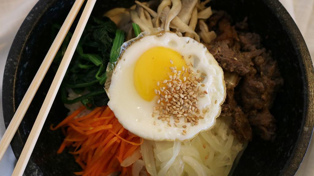 Bibimbap · Rice topped with vegetables, beef or deep fried tofu.
